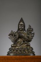 A Buddhist bronze 'portrait of Tsongkhapa', Tibet or China 18th century (h 11.5cm) (*)