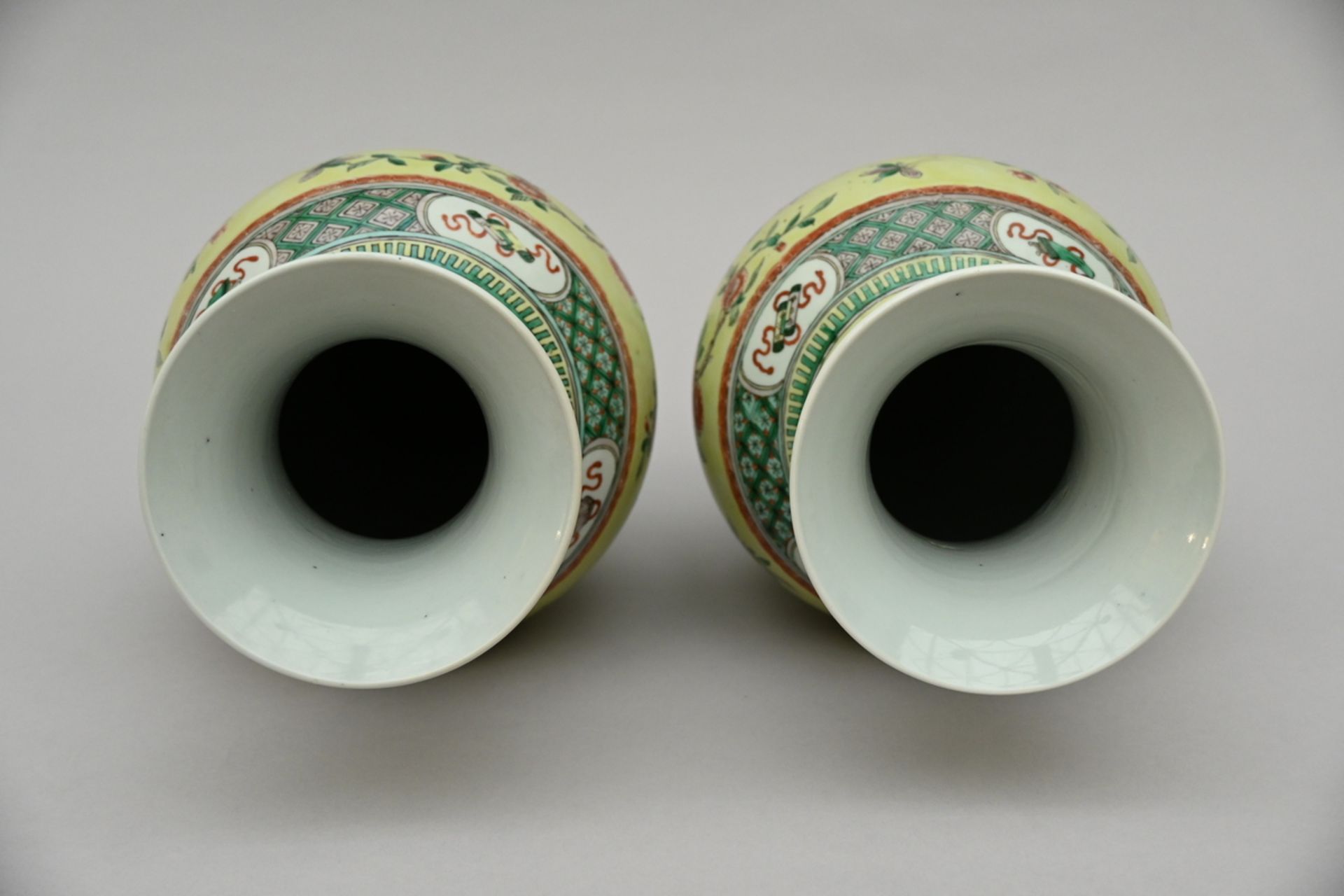 A pair of Chinese famille verte porcelain vases with yellow ground, 19th century (44.5cm) - Image 4 of 5