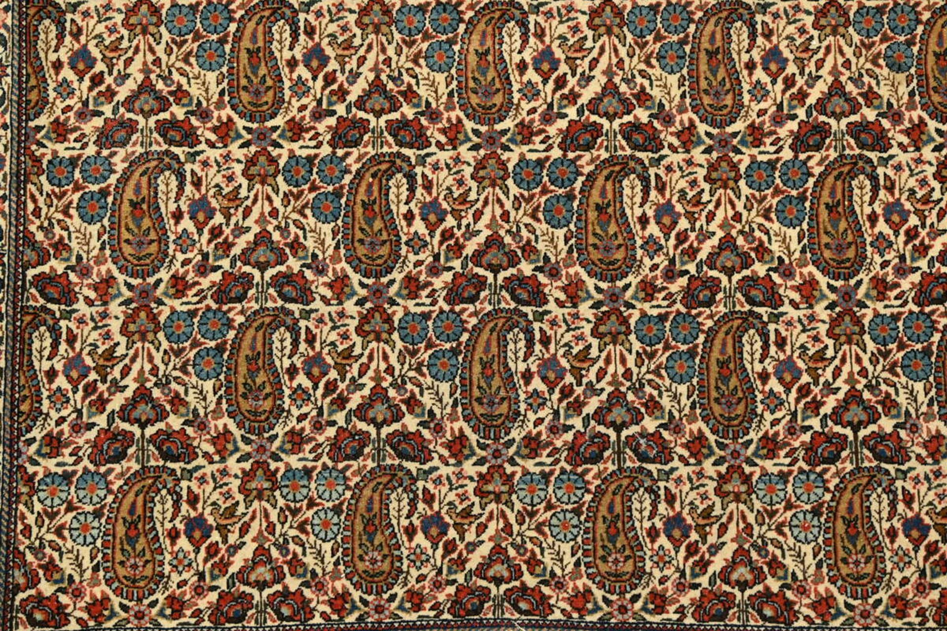 A Persian carpet 'floral decoration' (207x142cm) - Image 2 of 4