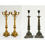 Two pairs of Charles X candlesticks (h 45-62cm)