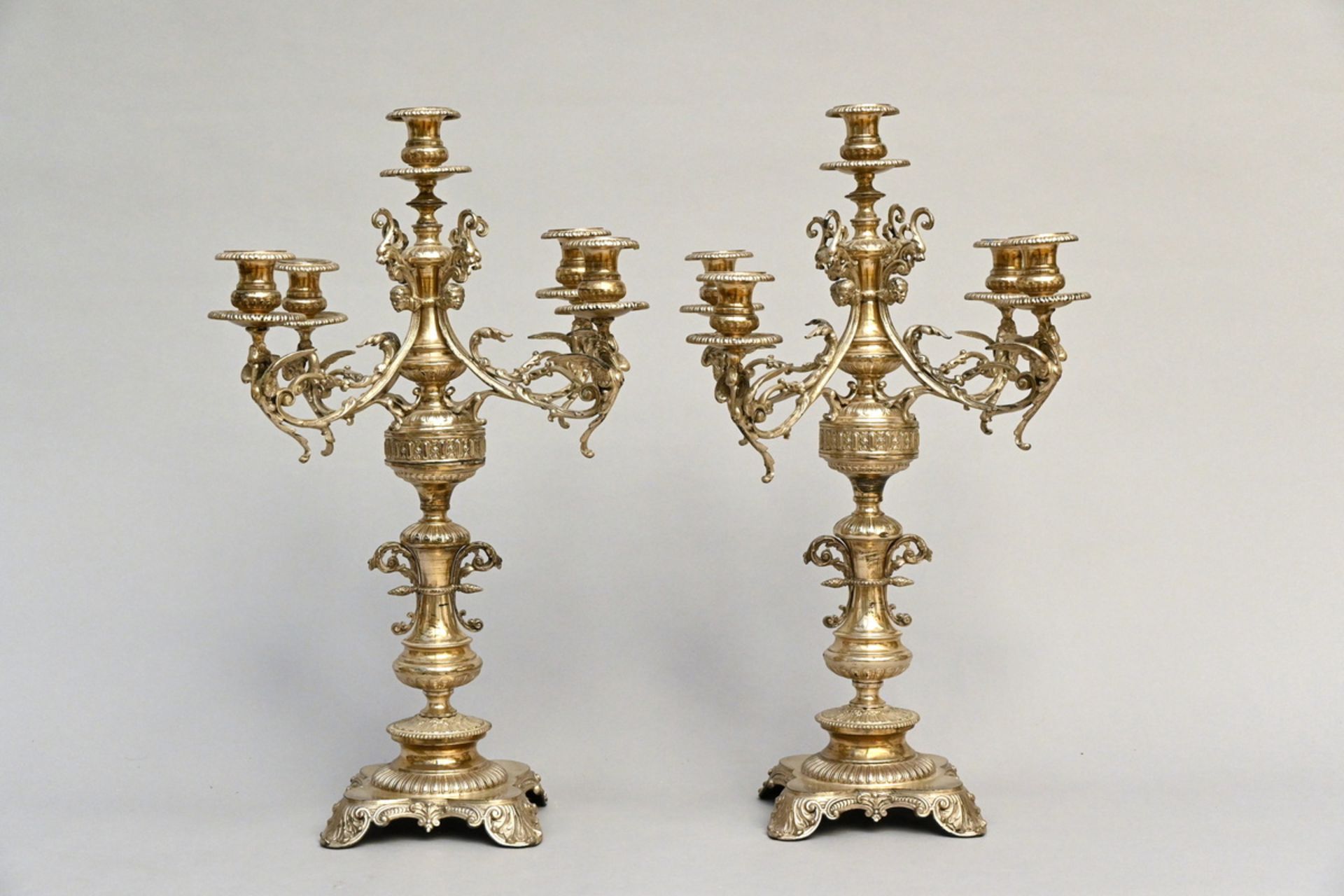 A pair of silverplated four-armed candlesticks (h59cm)