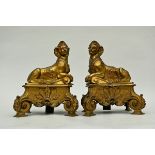 Pair of gilt bronze andirons 'Sphinxes' (37x30x21cm) (*)