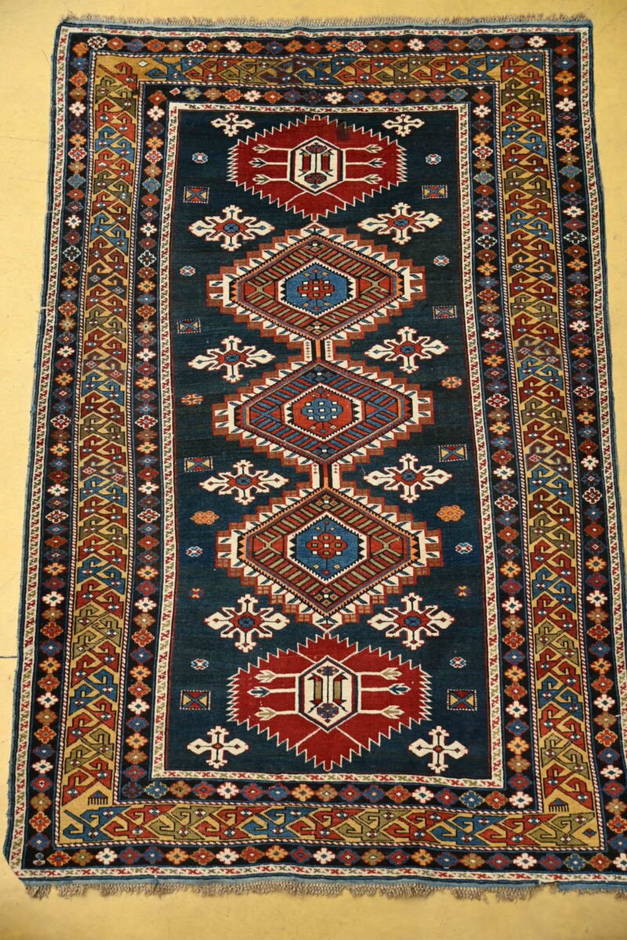 A Caucasian carpet (185x118cm)