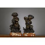 A pair of bronze statues on marble base 'Satyrs', 19th century (bronze h27cm)