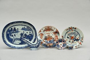 Collection of Chinese porcelain: sauceboat, two plates, charger and teacup, 18th century (*)