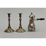 A pair of silver candlesticks (h23.5cm) and chocolate jug (h25cm) (total 1786grams)