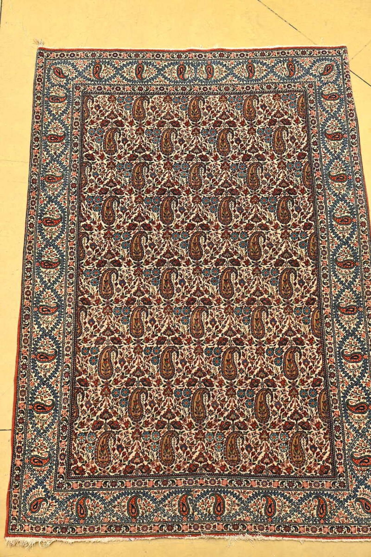 A Persian carpet 'floral decoration' (207x142cm)