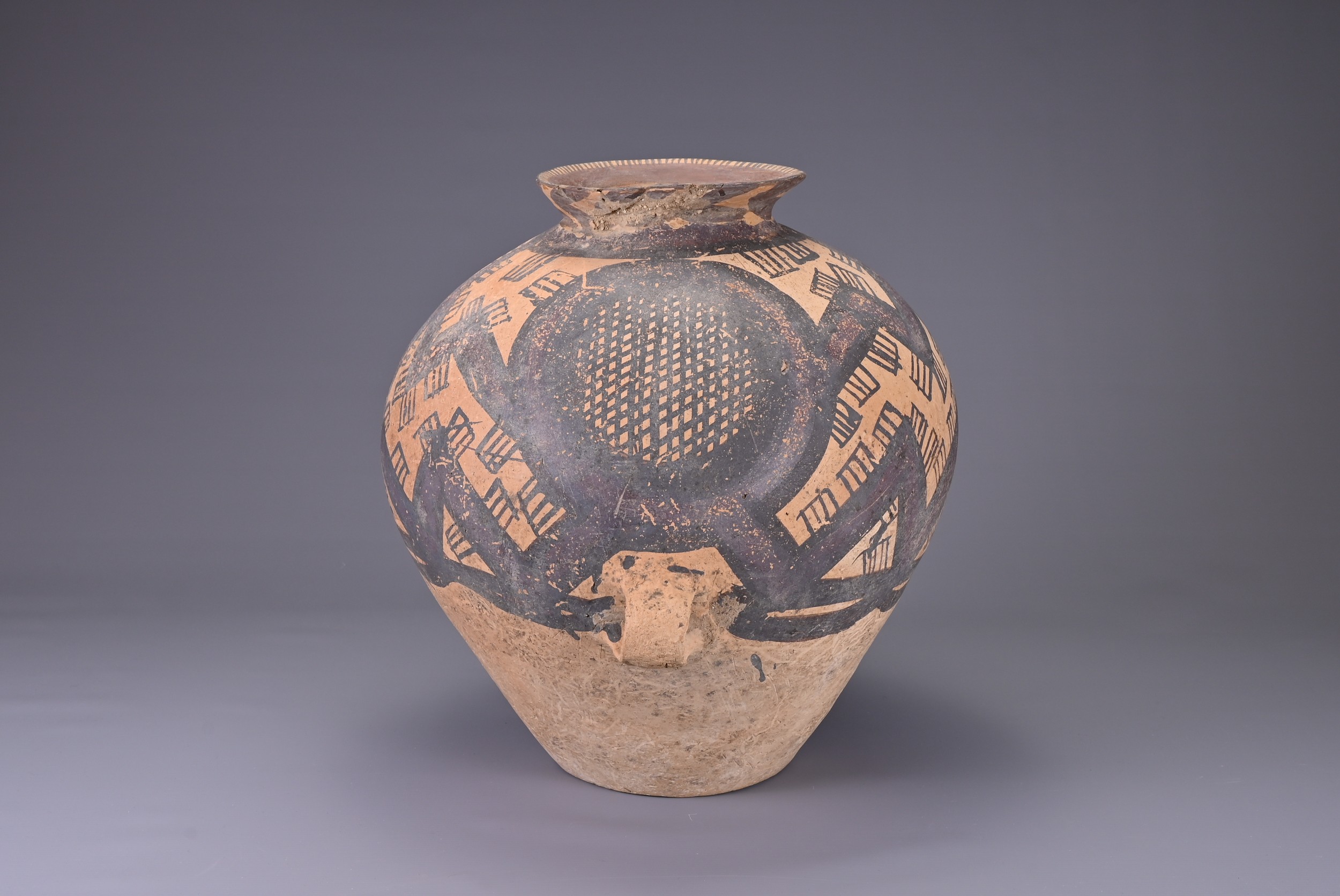 A LARGE CHINESE NEOLITHIC PAINTED POTTERY JAR, MACHANG (C. 2300 - 2000 BC). Fairly heavily potted in - Image 2 of 10