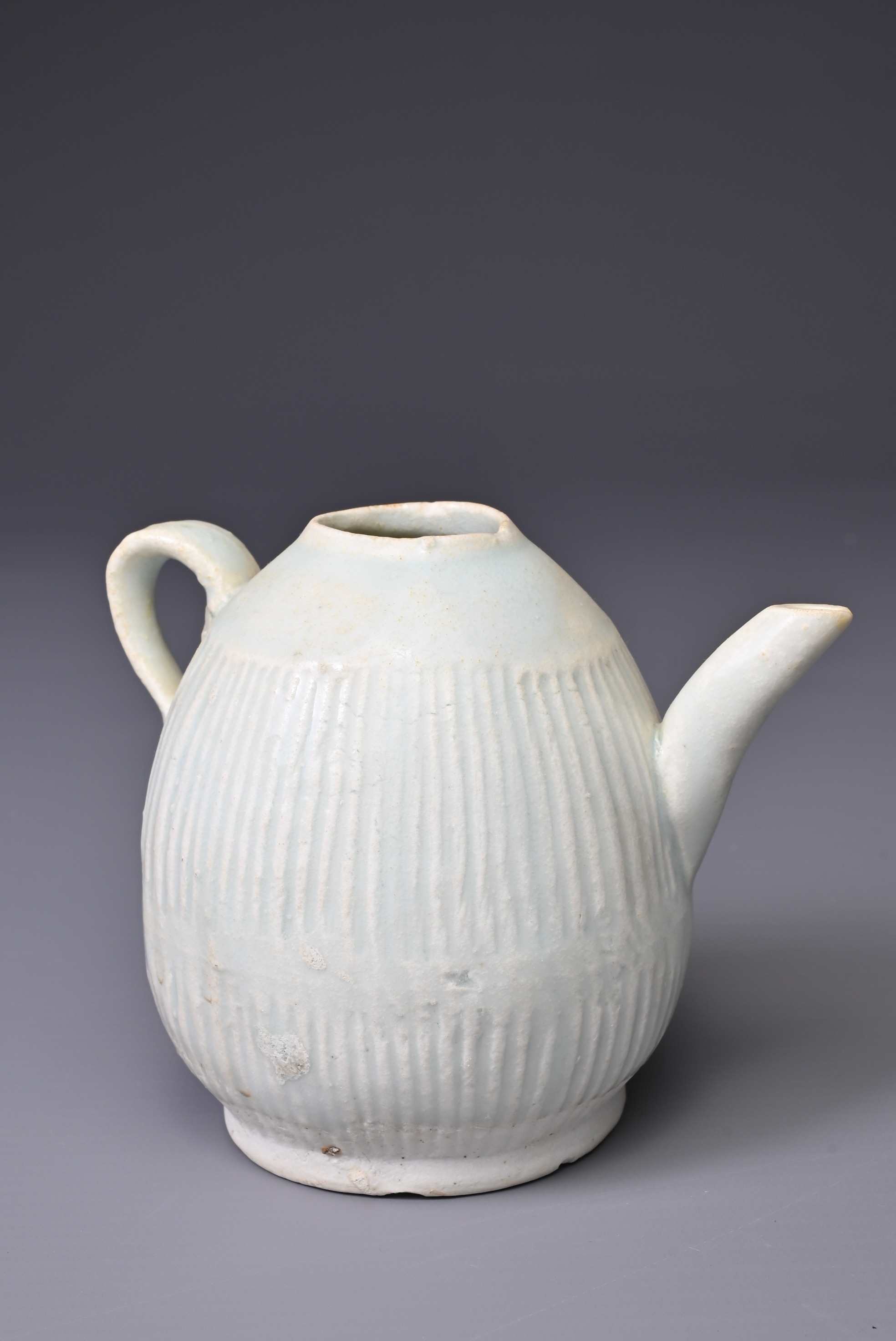 A CHINESE QINGBAI WARE EWER, SONG DYNASTY (960-1279). Finely potted ovoid body with continuous - Image 3 of 5