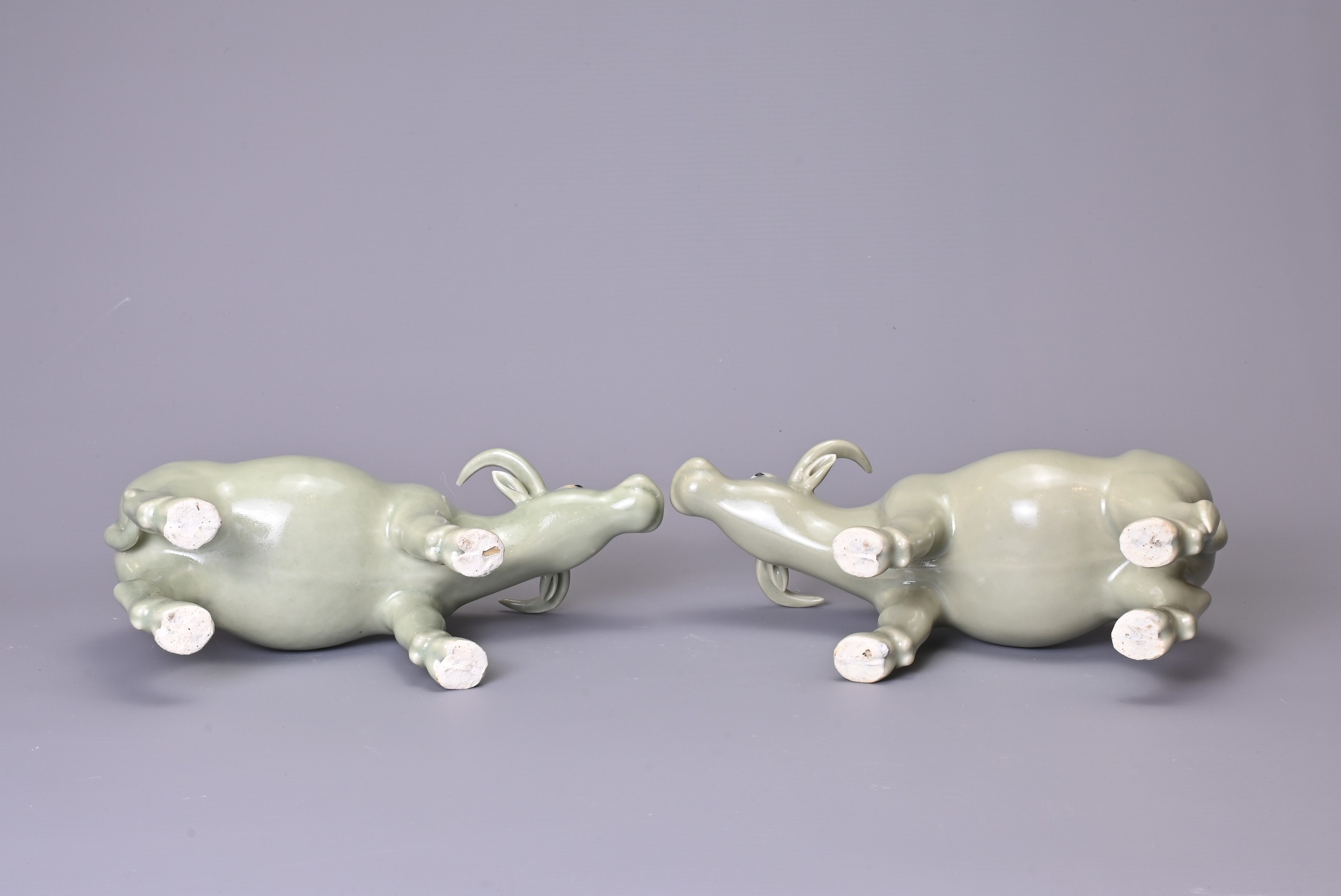 A PAIR OF CHINESE CELADON GLAZED PORCELAIN MODELS OF OX, 20th Century, approx. 21 cm long (2) - Image 5 of 5