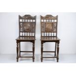 A PAIR OF CHINESE DECORATED SIDE CHAIRS, 19/20TH CENTURY. Each with carved square panel to the