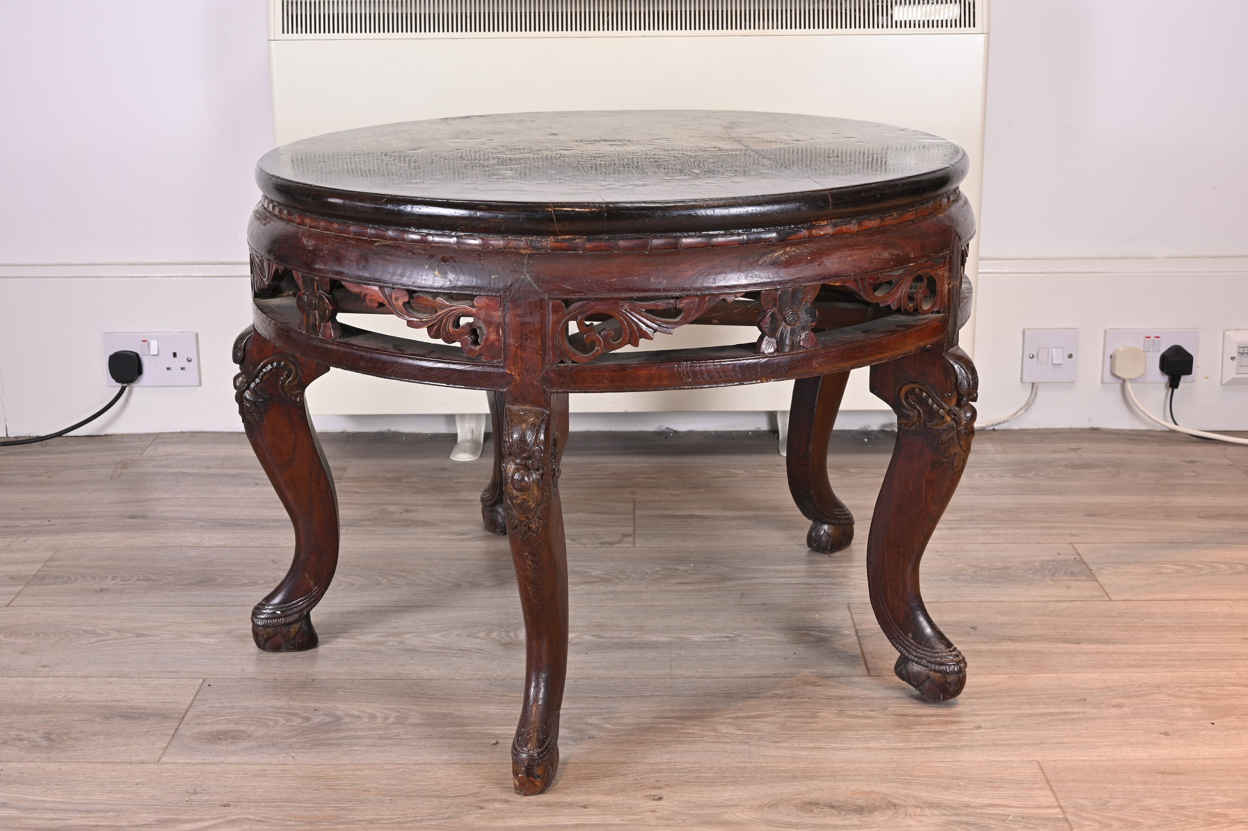 CHINESE 19TH/20TH CENTURY CIRCULAR HARDWOOD LOW TABLE, with black lacquer top and carved floral - Image 2 of 6