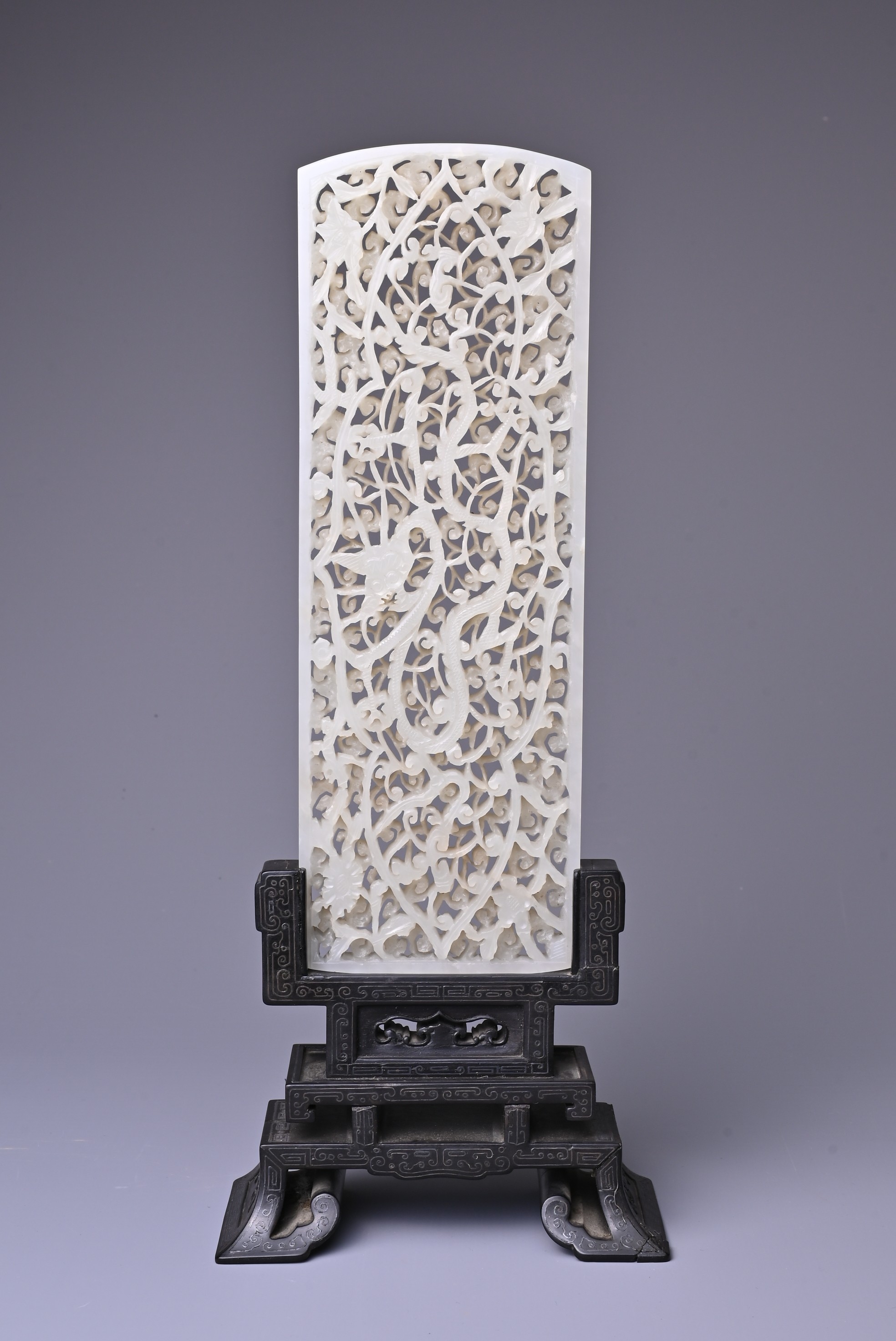 A LARGE CHINESE WHITE JADE PLAQUE, MING DYNASTY (1368-1644). Of rectangular form slightly rounded to