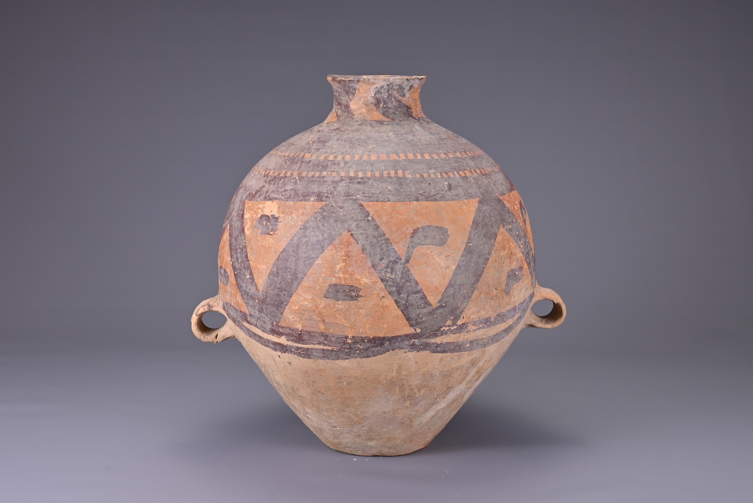 A LARGE CHINESE NEOLITHIC PAINTED POTTERY JAR, MACHANG (C. 2300 - 2000 BC). Fairly heavily potted in - Image 5 of 7