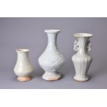 THREE CHINESE QINGBAI WARE VASES, SONG DYNASTY (960-1279). Each of various forms to include a