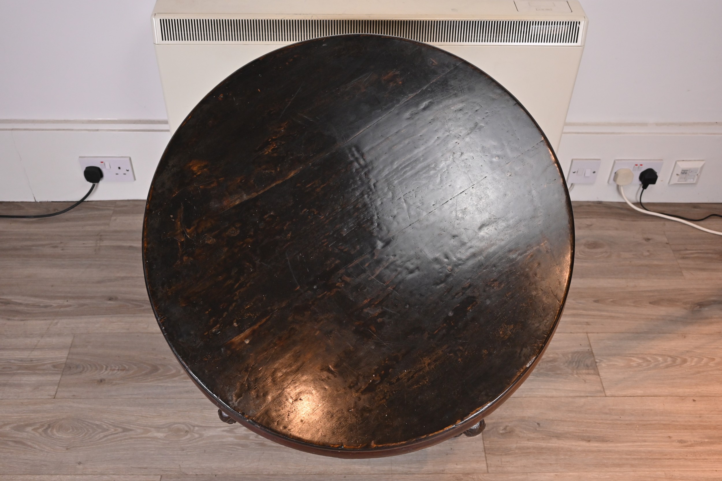 CHINESE 19TH/20TH CENTURY CIRCULAR HARDWOOD LOW TABLE, with black lacquer top and carved floral - Image 4 of 6