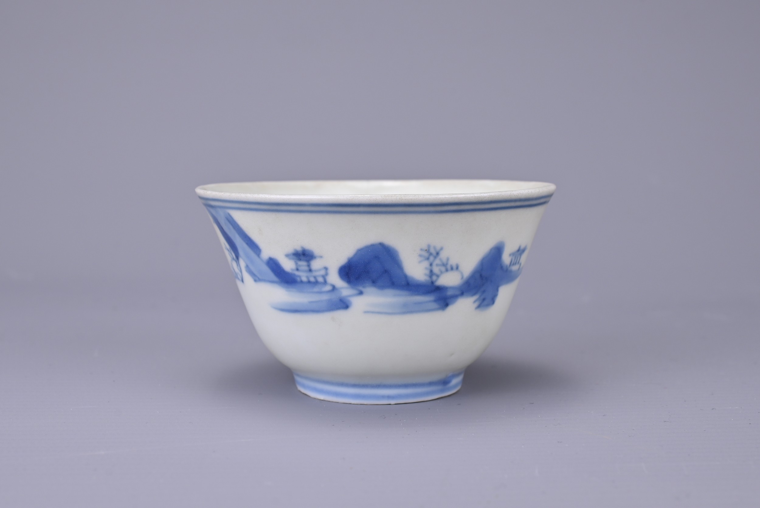 A CHINESE BLUE AND WHITE PORCELAIN CUP, CHENGHUA MARK. Decorated with boat in a coastal landscape