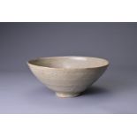 A KOREAN CELADON GLAZED BOWL, KORYO DYNASTY (AD 918 - 1392). Glazed all over in quite a thick and