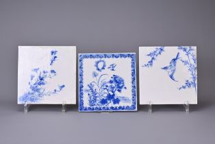 THREE CHINESE BLUE AND WHITE PORCELAIN TILES, 19/20TH CENTURY. Each of square form decorated with