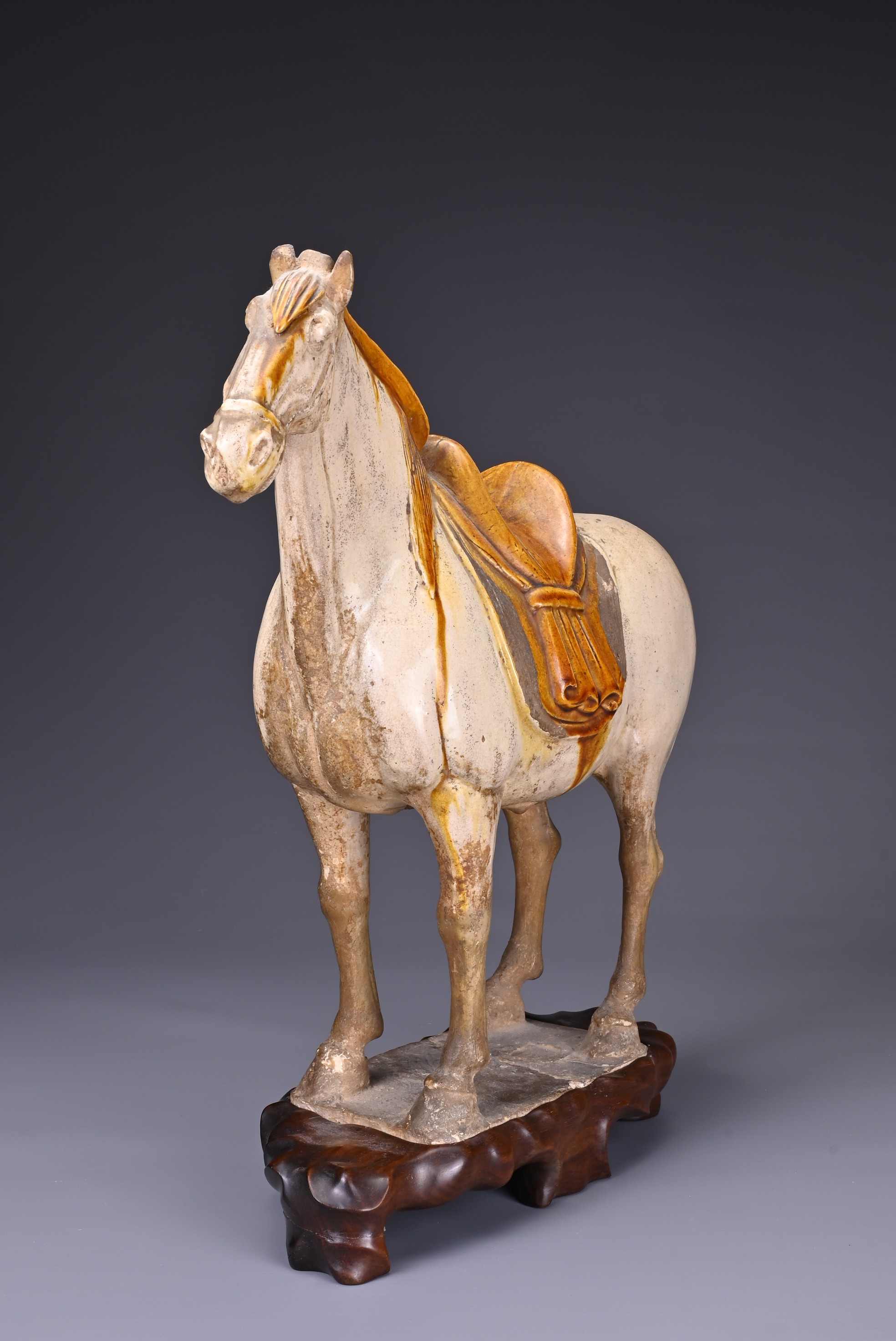 A CHINESE SANCAI GLAZED POTTERY MODEL OF A HORSE, TANG DYNASTY (AD 618-907). Modelled standing - Image 3 of 7