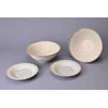 TWO PAIRS OF CHINESE QINGBAI WARE ITEMS, SONG / YUAN DYNASTY. To include a pair of moulded bowls