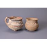 TWO POTTERY POTS, CHINESE AND POSSIBLY GREEK. The Chinese pot with rounded body with a band of studs