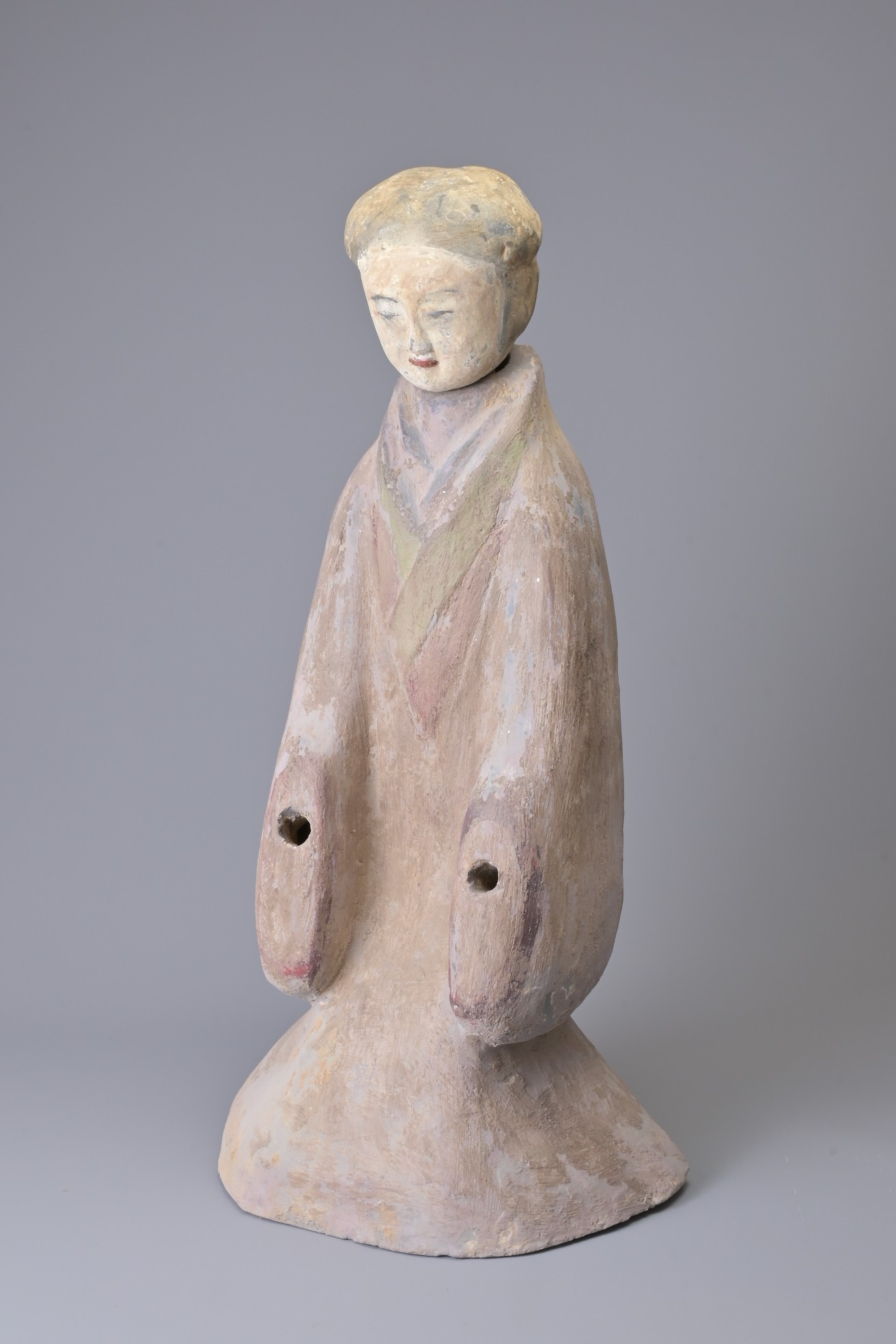 A LARGE CHINESE PAINTED GREY POTTERY FIGURE OF KNEELING COURT LADY, HAN DYNASTY. Heavily potted