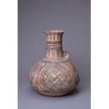 A CHINESE NEOLITHIC PAINTED POTTERY EWER, MACHANG CULTURE (2500-2000 BC). Rounded body leading