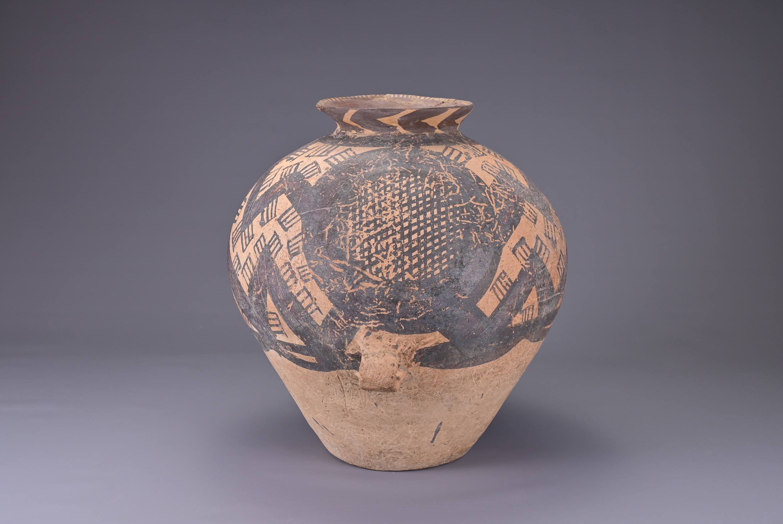 A LARGE CHINESE NEOLITHIC PAINTED POTTERY JAR, MACHANG (C. 2300 - 2000 BC). Fairly heavily potted in - Image 4 of 10