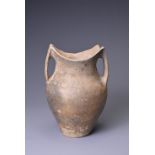 A CHINESE NEOLITHIC BLACK POTTERY JAR, SIWA CULTURE (C. 1350 BC). Heavily potted with a smooth