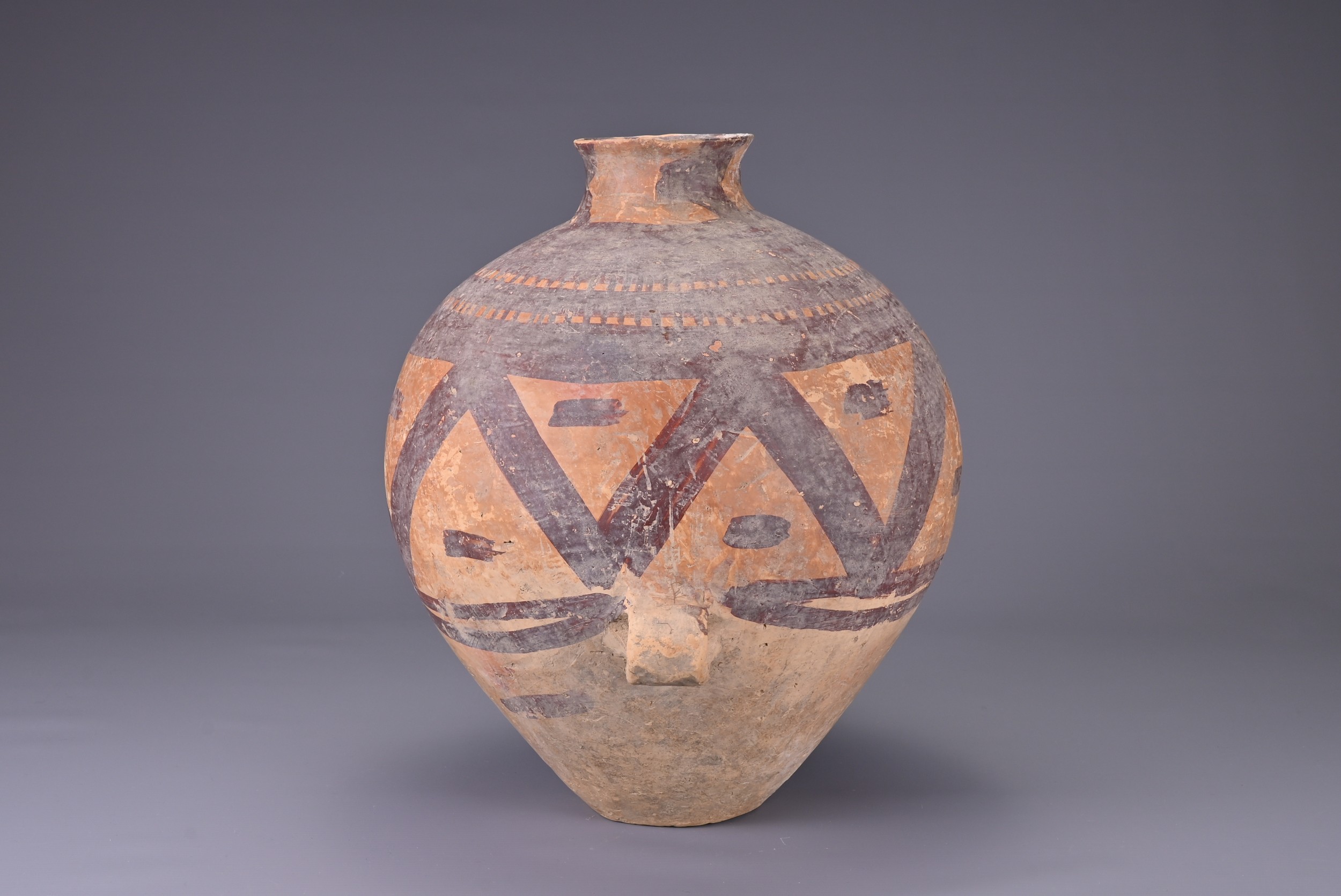 A LARGE CHINESE NEOLITHIC PAINTED POTTERY JAR, MACHANG (C. 2300 - 2000 BC). Fairly heavily potted in - Image 2 of 7