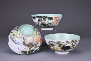 THREE CHINESE PORCELAIN BOWLS ENAMELLED WITH RABBITS, 20TH CENTURY. Each with apocryphal