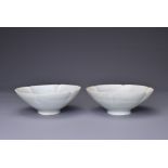 A PAIR OF CHINESE FOLIATE DISHES, YUAN DYNASTY (1279-1368). Each with six lobed sides with central