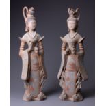 A LARGE PAIR OF CHINESE PAINTED POTTERY FIGURES OF DANCERS, TL TESTED AS TANG DYNASTY (AD 618-907)