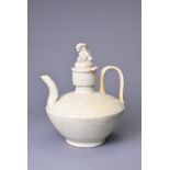 A CHINESE QINGBAI WARE PORCELAIN EWER, SONG DYNASTY (960-1279). Flattened shoulder on a rounded