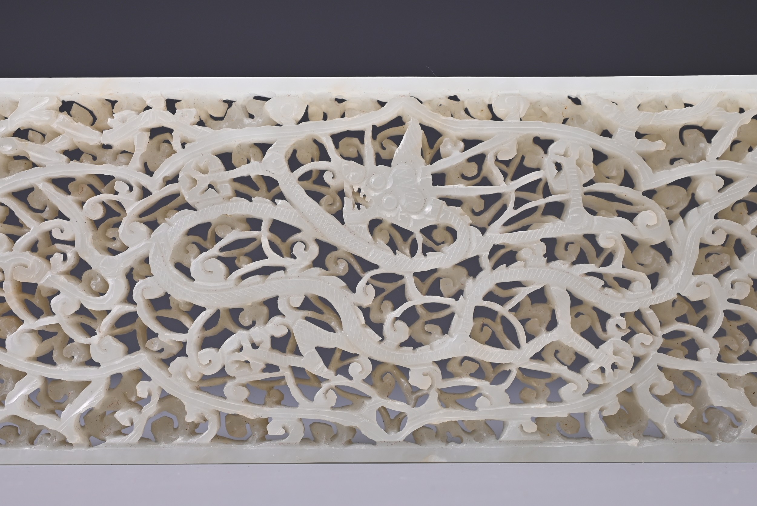 A LARGE CHINESE WHITE JADE PLAQUE, MING DYNASTY (1368-1644). Of rectangular form slightly rounded to - Image 7 of 8