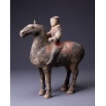 A CHINESE PAINTED POTTERY HORSE AND RIDER, HAN DYNASTY (206 BC-AD 220). The horse modelled