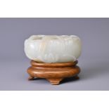 A CHINESE WHITE JADE AND RUSSET BRUSH WASHER / WATER POT, QING DYNASTY. Of ovoid form with