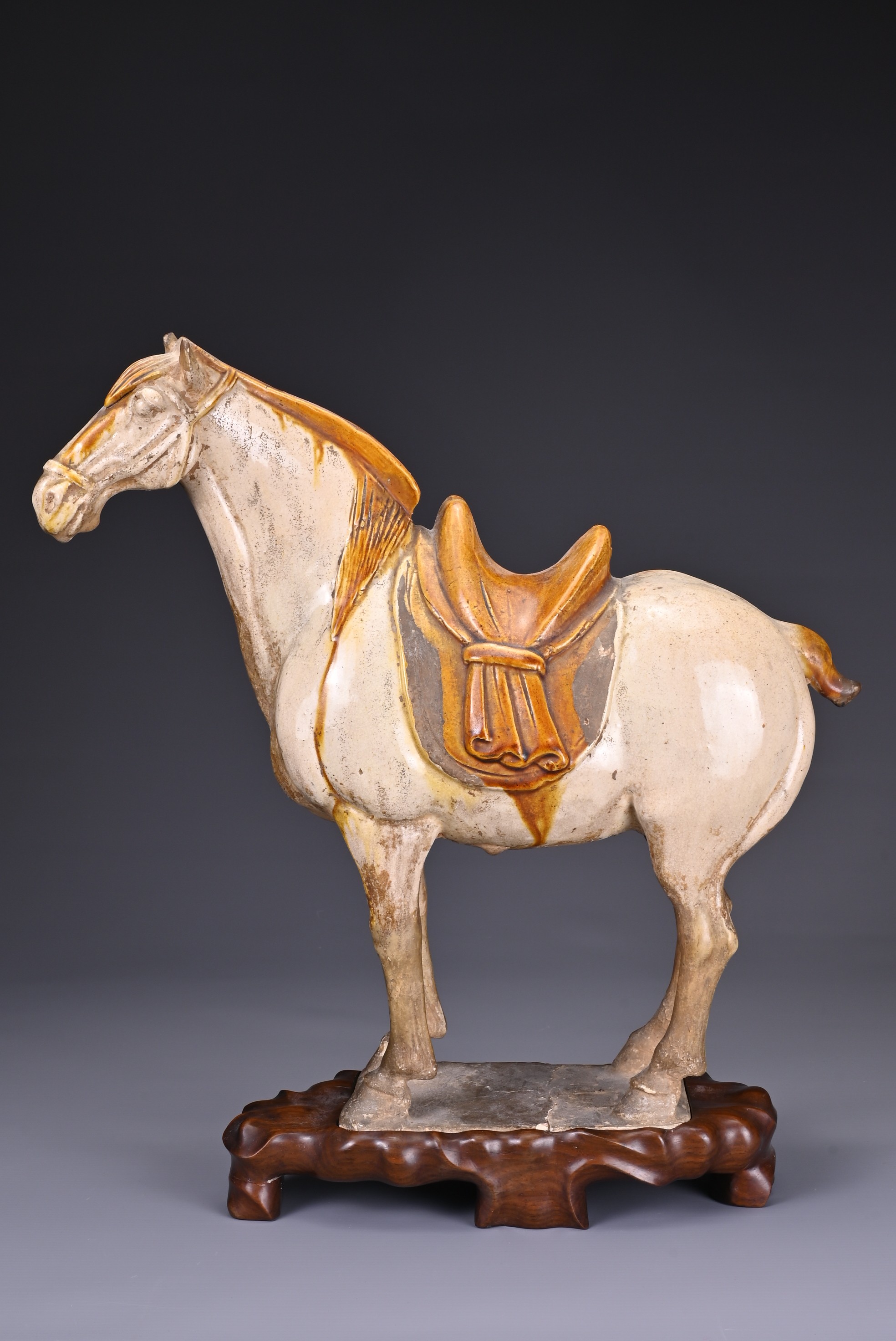 A CHINESE SANCAI GLAZED POTTERY MODEL OF A HORSE, TANG DYNASTY (AD 618-907). Modelled standing - Image 7 of 7