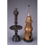 TWO SOUTH-EAST ASIAN HARDWOOD LAMPS: one turned lamp table and one converted antique balustrade,