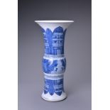 A CHINESE BLUE AND WHITE PORCELAIN GU VASE. Decorated with archaistic Taotie masks to the central