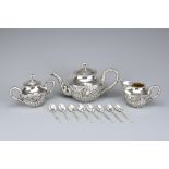 A CHINESE SILVER TEA SET, WING NAM, HONG KONG EARLY 20TH CENTURY. Comprising a tea pot, sugar pot