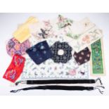 A COLLECTION OF CHINESE EMBROIDERED FRAGMENTS, COLLARS AND OTHER ITEMS. Including: a red silk