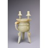 A CHINESE CELADON JADE TRIPOD VESSEL, JIA, QING DYNASTY. Modelled on the archaic bronze ceremonial