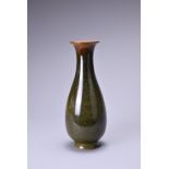 A HONG KONG MADE STUDIO POTTERY TEA DUST GLAZED PEAR-SHAPED VASE. Tall slender form with flared