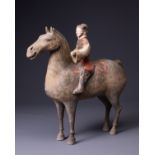 A CHINESE PAINTED POTTERY HORSE AND RIDER, HAN DYNASTY (206 BC-AD 220). The horse modelled