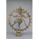 A LARGE INDIAN BRONZE FIGURE OF SHIVA. Depicted dancing on the prostrate dwarf on lotus base