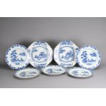 SEVEN CHINESE BLUE AND WHITE EXPORT PORCELAIN DISHES, 18TH CENTURY. To include a pair and set of
