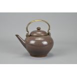 A CHINESE YIXING ZISHA POTTERY TEAPOT, FOR THAI MARKET 19/20TH CENTURY. Good quality pot of purplish