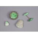 FOUR CHINESE JADE JADEITE ITEMS, 20TH CENTURY. To include a silver mounted jadeite brooch, stamped